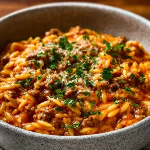 Delicious Beef Orzo with Tomato Cream Sauce served in a bowl