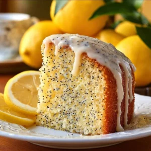 Delicious lemon poppy seed cake topped with fresh lemon zest and poppy seeds